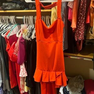 Vibrant Reddish Orange Dress with Ruffle Hem